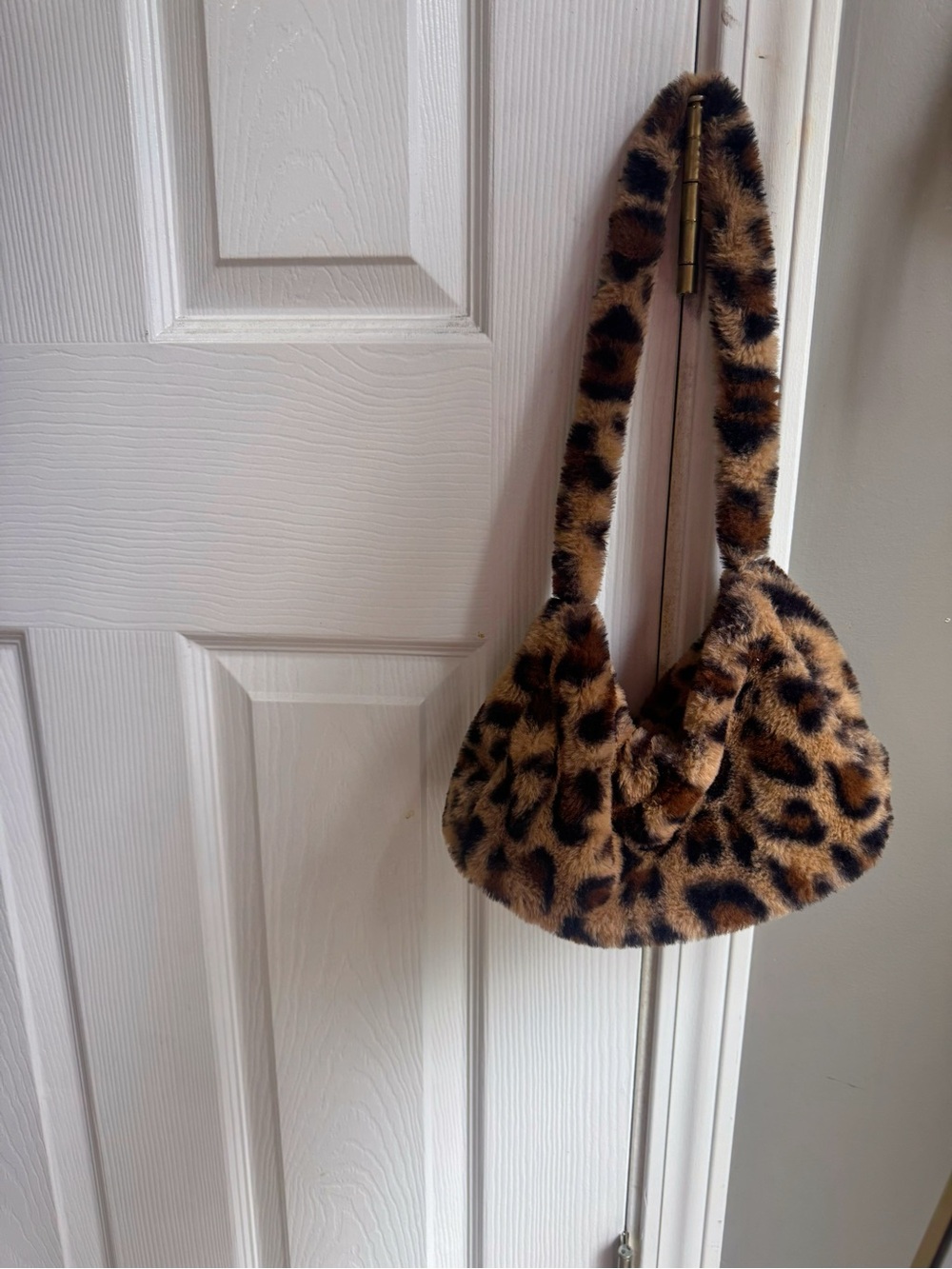 Leopard print faux fur handbag